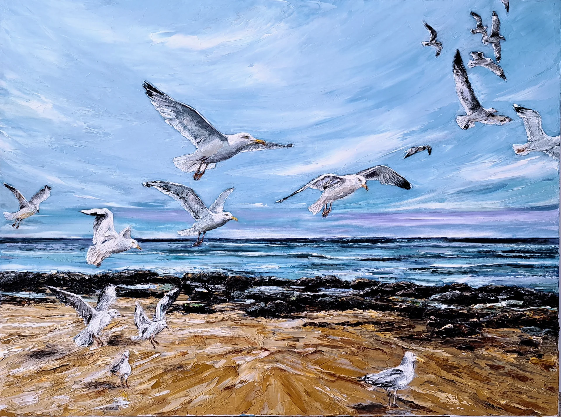 Seagulls over beach