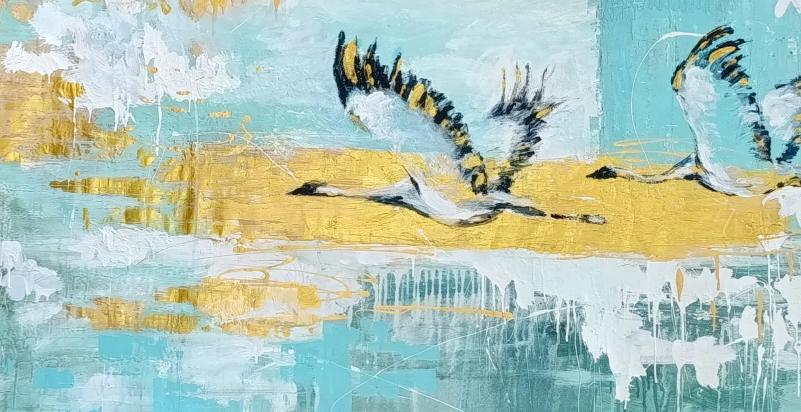 cranes on a golden line