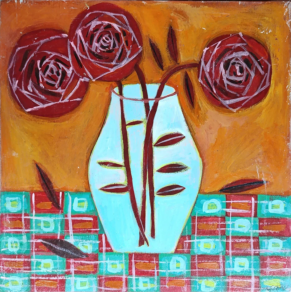 A vase with red roses