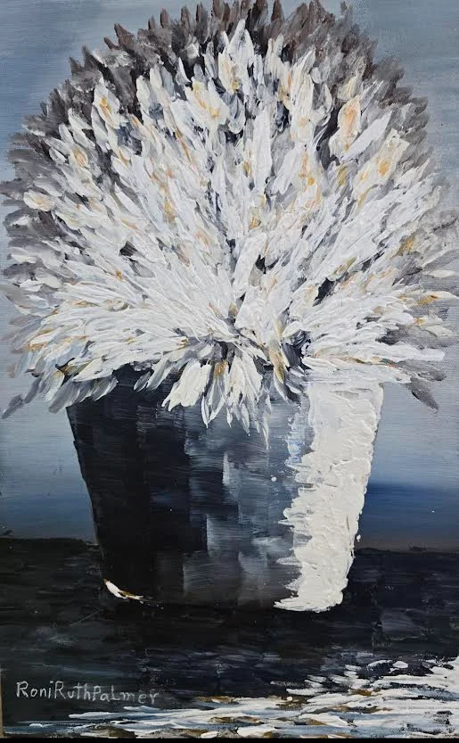 Vase with plenty of flowers